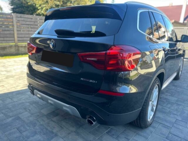 Чорний БМВ Х3, об'ємом двигуна 2 л та пробігом 44 тис. км за 17000 $, фото 4 на Automoto.ua