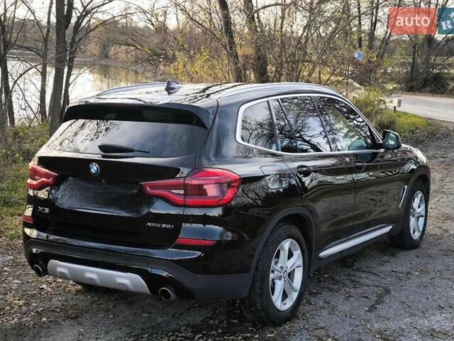 Черный БМВ Х3, объемом двигателя 2 л и пробегом 84 тыс. км за 34000 $, фото 3 на Automoto.ua