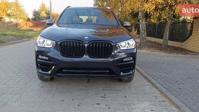 Чорний БМВ Х3, об'ємом двигуна 2 л та пробігом 78 тис. км за 28000 $, фото 2 на Automoto.ua