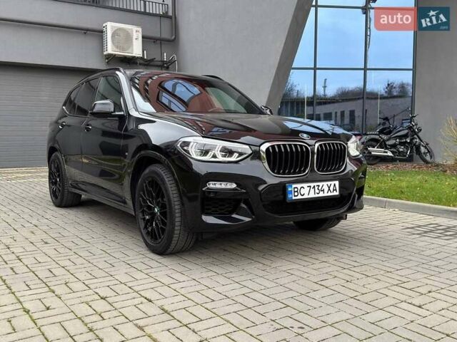 Чорний БМВ Х3, об'ємом двигуна 2 л та пробігом 112 тис. км за 28000 $, фото 4 на Automoto.ua