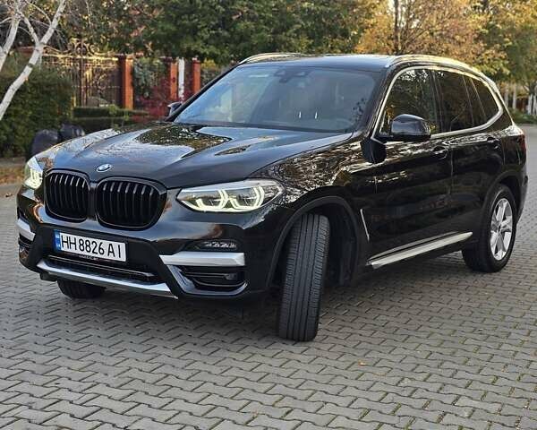 Чорний БМВ Х3, об'ємом двигуна 2 л та пробігом 99 тис. км за 25900 $, фото 2 на Automoto.ua