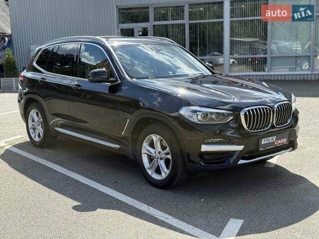 Черный БМВ Х3, объемом двигателя 2 л и пробегом 80 тыс. км за 32900 $, фото 1 на Automoto.ua