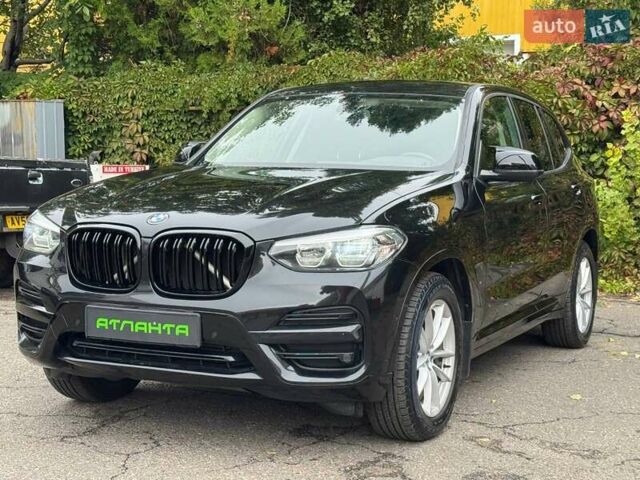 Чорний БМВ Х3, об'ємом двигуна 2 л та пробігом 115 тис. км за 29900 $, фото 1 на Automoto.ua