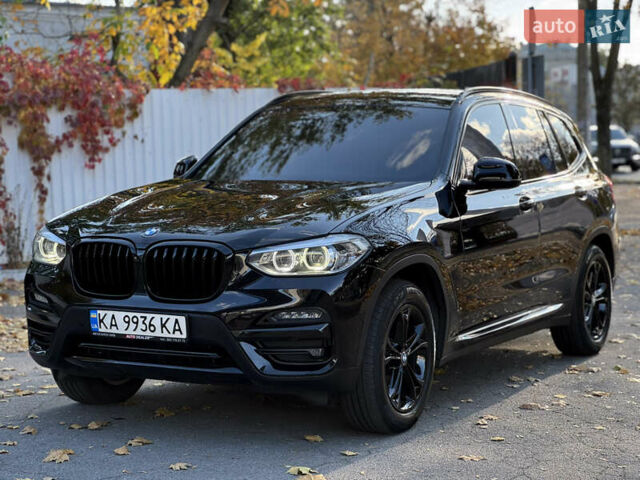 Черный БМВ Х3, объемом двигателя 2 л и пробегом 65 тыс. км за 28999 $, фото 1 на Automoto.ua