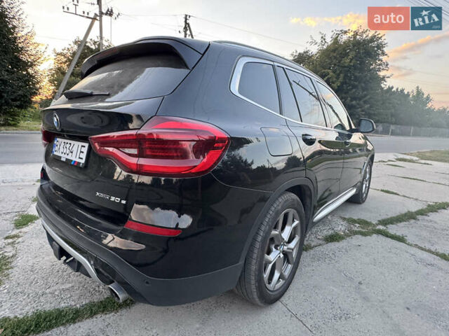 Черный БМВ Х3, объемом двигателя 2 л и пробегом 104 тыс. км за 34000 $, фото 4 на Automoto.ua