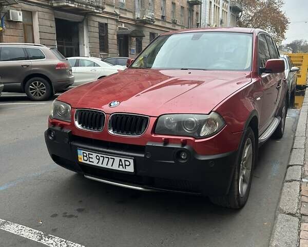 Красный БМВ Х3, объемом двигателя 3 л и пробегом 210 тыс. км за 9000 $, фото 1 на Automoto.ua