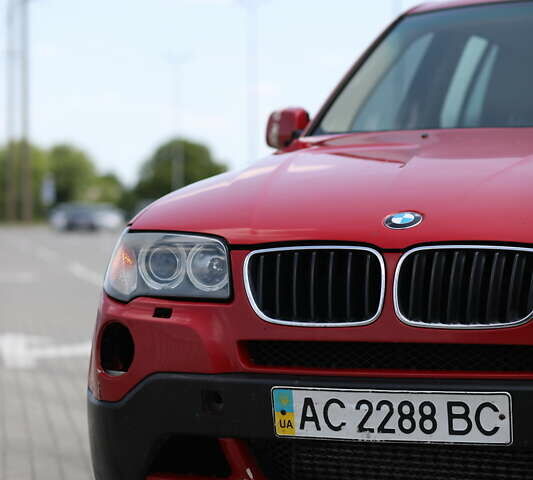 Красный БМВ Х3, объемом двигателя 2 л и пробегом 300 тыс. км за 8000 $, фото 1 на Automoto.ua