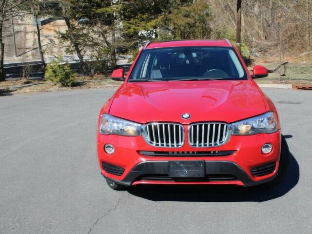 Красный БМВ Х3, объемом двигателя 2 л и пробегом 75 тыс. км за 10500 $, фото 1 на Automoto.ua