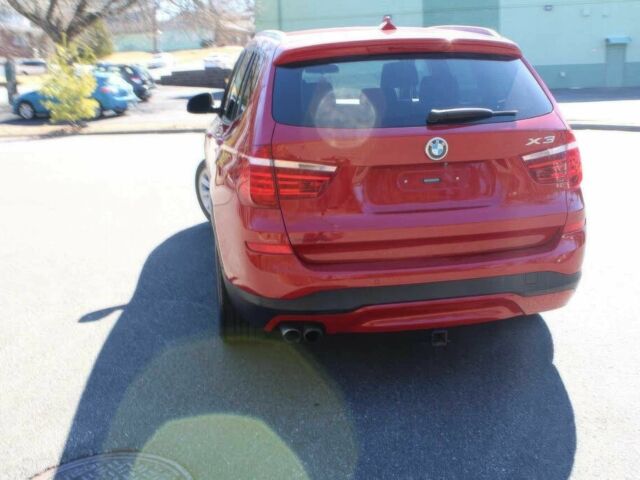 Красный БМВ Х3, объемом двигателя 2 л и пробегом 75 тыс. км за 10500 $, фото 4 на Automoto.ua