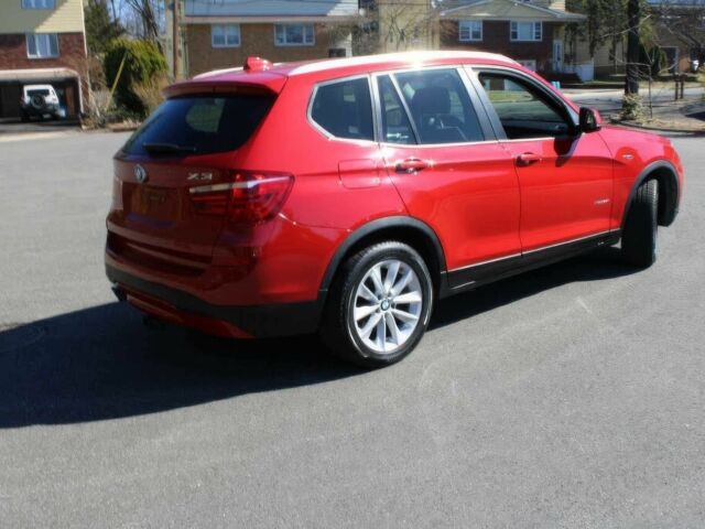 Красный БМВ Х3, объемом двигателя 2 л и пробегом 75 тыс. км за 10500 $, фото 5 на Automoto.ua