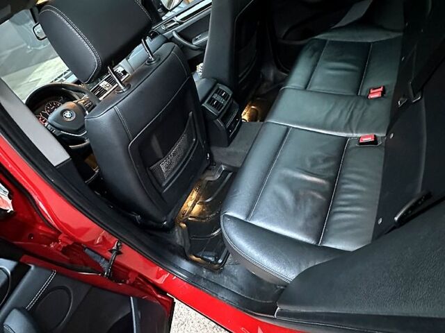 Красный БМВ Х3, объемом двигателя 2 л и пробегом 150 тыс. км за 19500 $, фото 3 на Automoto.ua