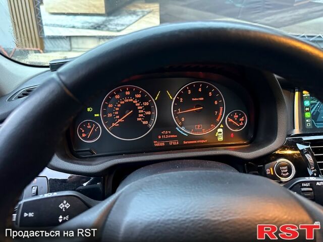 Красный БМВ Х3, объемом двигателя 2 л и пробегом 150 тыс. км за 19500 $, фото 4 на Automoto.ua