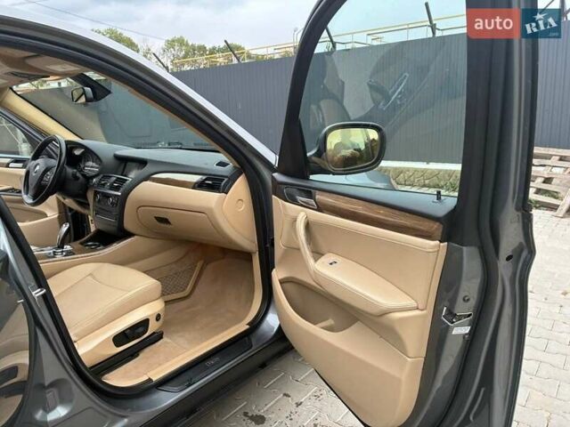 Серый БМВ Х3, объемом двигателя 2 л и пробегом 193 тыс. км за 13200 $, фото 4 на Automoto.ua