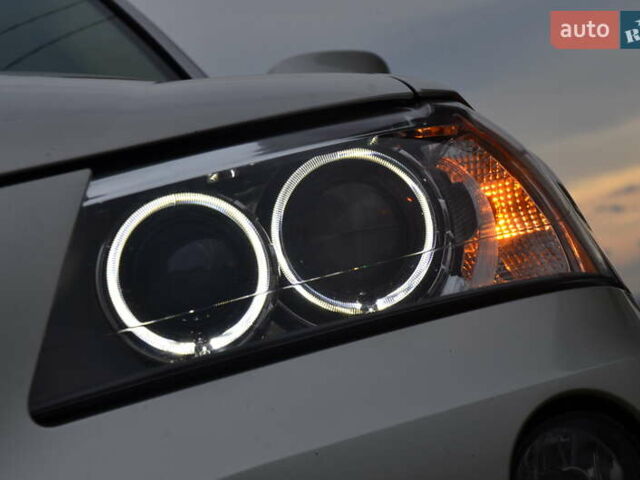 Серый БМВ Х3, объемом двигателя 2 л и пробегом 158 тыс. км за 12850 $, фото 9 на Automoto.ua