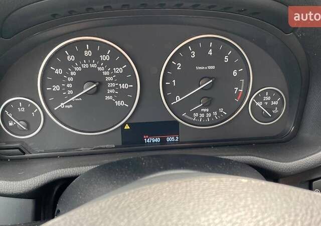 Серый БМВ Х3, объемом двигателя 1.6 л и пробегом 148 тыс. км за 10800 $, фото 10 на Automoto.ua