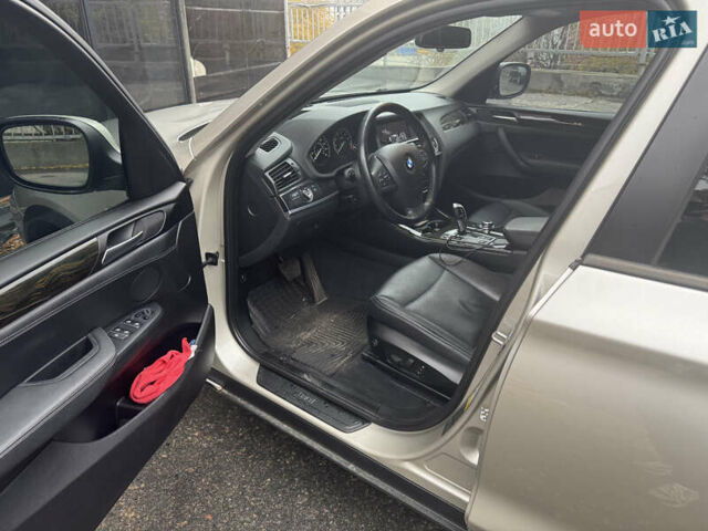Серый БМВ Х3, объемом двигателя 2 л и пробегом 144 тыс. км за 14000 $, фото 7 на Automoto.ua