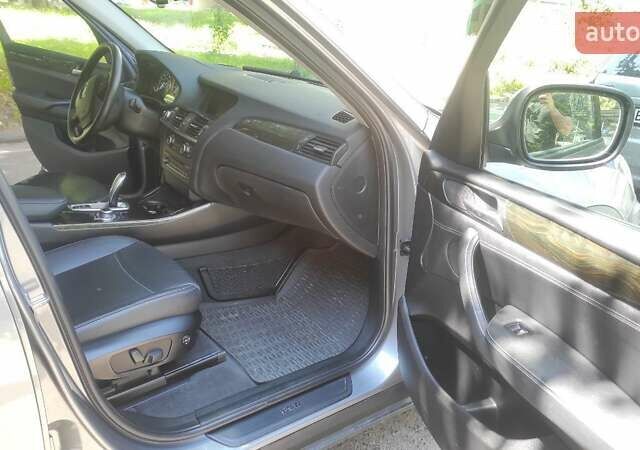 Серый БМВ Х3, объемом двигателя 2 л и пробегом 213 тыс. км за 14000 $, фото 4 на Automoto.ua