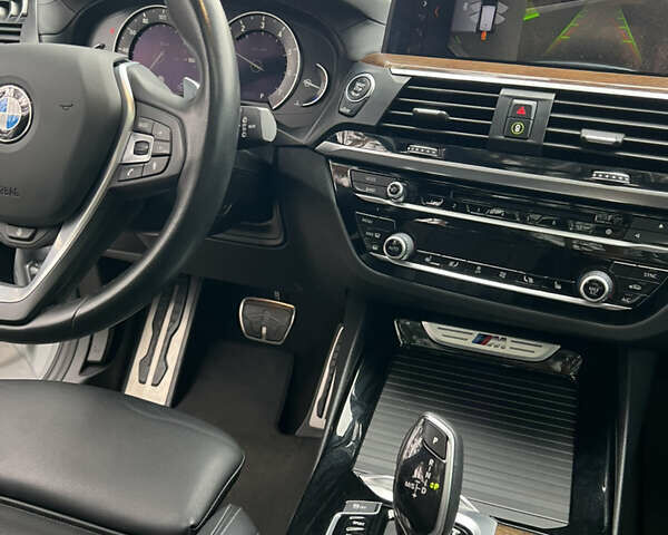 Серый БМВ Х3, объемом двигателя 3 л и пробегом 115 тыс. км за 36999 $, фото 20 на Automoto.ua