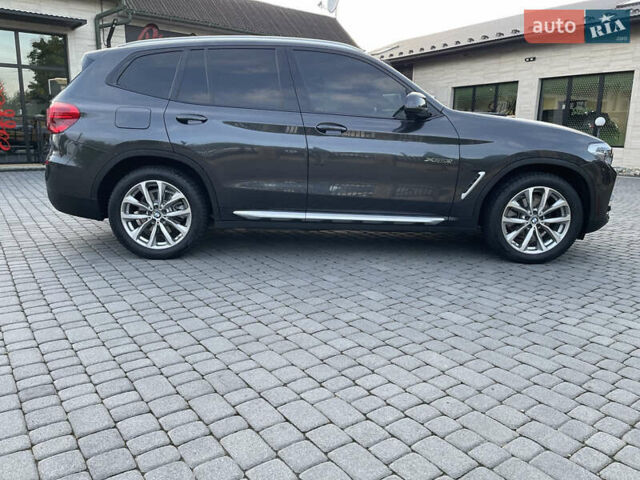 Серый БМВ Х3, объемом двигателя 2 л и пробегом 75 тыс. км за 29500 $, фото 7 на Automoto.ua