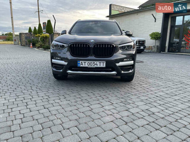 Серый БМВ Х3, объемом двигателя 2 л и пробегом 75 тыс. км за 29500 $, фото 6 на Automoto.ua