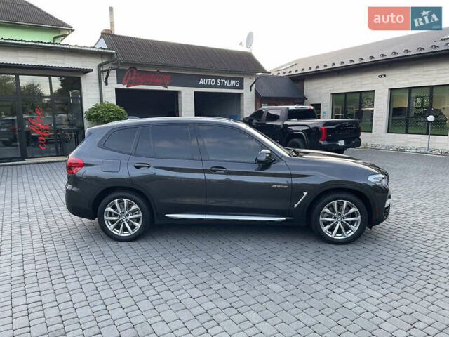 Серый БМВ Х3, объемом двигателя 2 л и пробегом 75 тыс. км за 29500 $, фото 3 на Automoto.ua