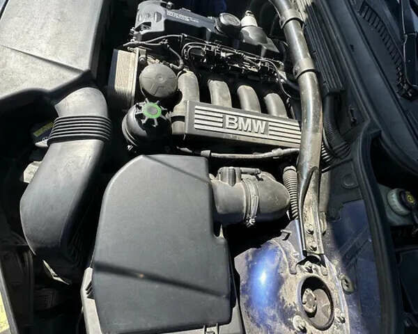 Синий БМВ Х3, объемом двигателя 2.5 л и пробегом 223 тыс. км за 8900 $, фото 5 на Automoto.ua