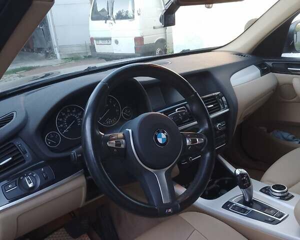 Синій БМВ Х3, об'ємом двигуна 2 л та пробігом 181 тис. км за 11900 $, фото 4 на Automoto.ua