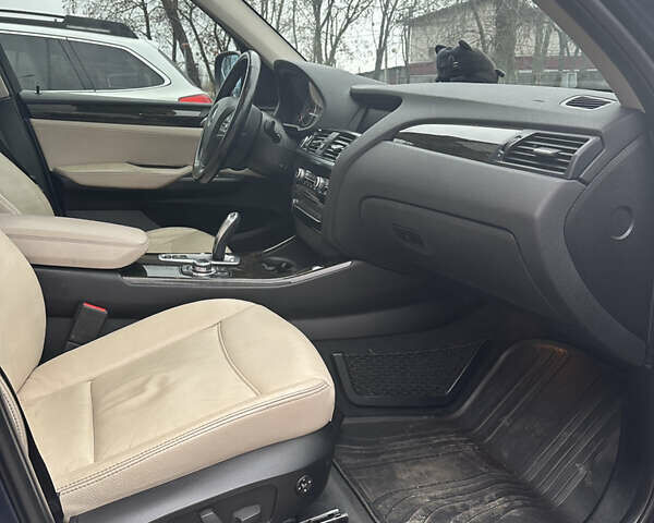 Синій БМВ Х3, об'ємом двигуна 2 л та пробігом 167 тис. км за 14000 $, фото 12 на Automoto.ua