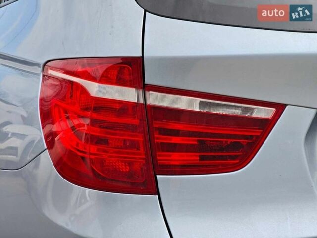 Синій БМВ Х3, об'ємом двигуна 2 л та пробігом 195 тис. км за 14990 $, фото 10 на Automoto.ua