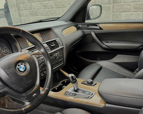Синий БМВ Х3, объемом двигателя 2 л и пробегом 192 тыс. км за 12800 $, фото 19 на Automoto.ua