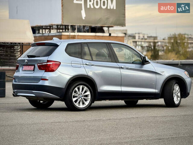 Синій БМВ Х3, об'ємом двигуна 2 л та пробігом 97 тис. км за 13900 $, фото 3 на Automoto.ua