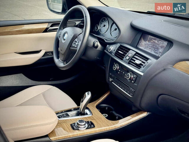 Синій БМВ Х3, об'ємом двигуна 2 л та пробігом 97 тис. км за 13900 $, фото 21 на Automoto.ua