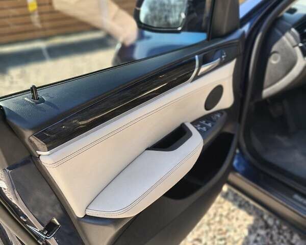 Синій БМВ Х3, об'ємом двигуна 2 л та пробігом 198 тис. км за 18400 $, фото 14 на Automoto.ua