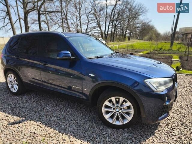 Синій БМВ Х3, об'ємом двигуна 2 л та пробігом 198 тис. км за 18400 $, фото 3 на Automoto.ua
