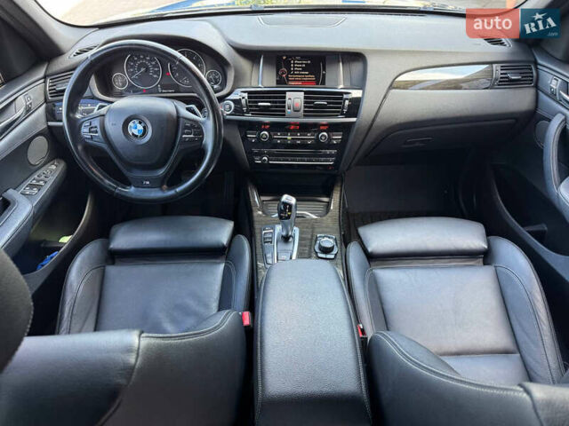 Синій БМВ Х3, об'ємом двигуна 2 л та пробігом 214 тис. км за 17900 $, фото 26 на Automoto.ua