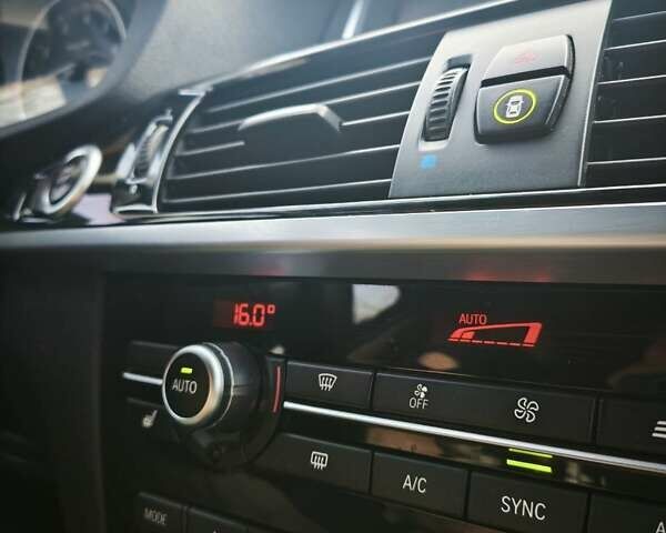 Синій БМВ Х3, об'ємом двигуна 2 л та пробігом 198 тис. км за 18400 $, фото 28 на Automoto.ua