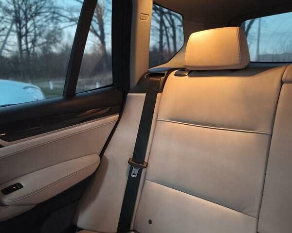 Синій БМВ Х3, об'ємом двигуна 2 л та пробігом 198 тис. км за 18400 $, фото 33 на Automoto.ua