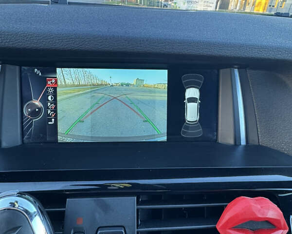 Синій БМВ Х3, об'ємом двигуна 2 л та пробігом 84 тис. км за 19900 $, фото 29 на Automoto.ua