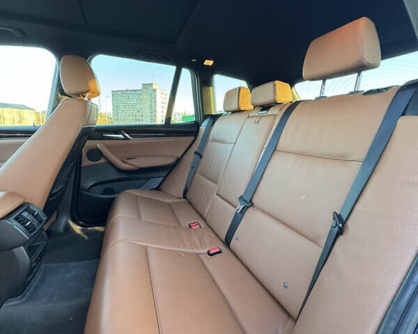 Синій БМВ Х3, об'ємом двигуна 2 л та пробігом 84 тис. км за 19900 $, фото 15 на Automoto.ua