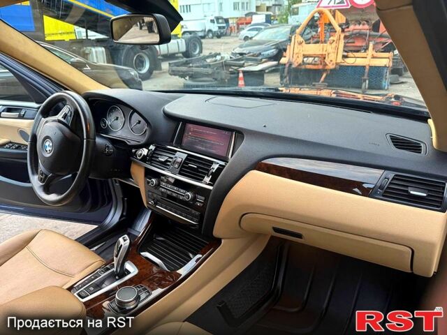 Синій БМВ Х3, об'ємом двигуна 2 л та пробігом 162 тис. км за 16000 $, фото 4 на Automoto.ua