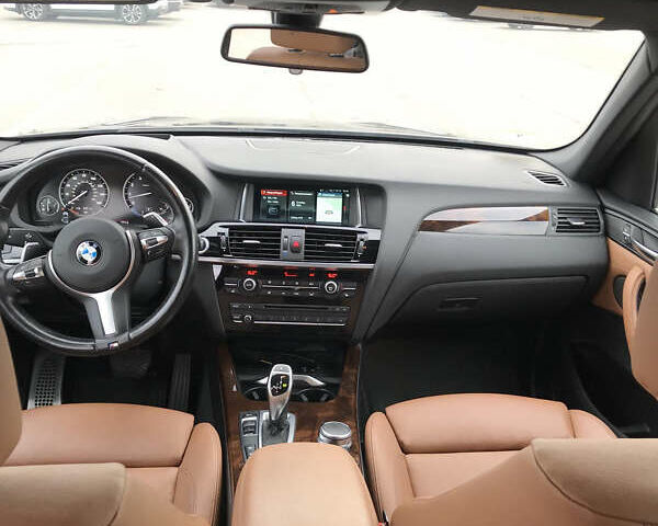 Синий БМВ Х3, объемом двигателя 3 л и пробегом 147 тыс. км за 23500 $, фото 4 на Automoto.ua