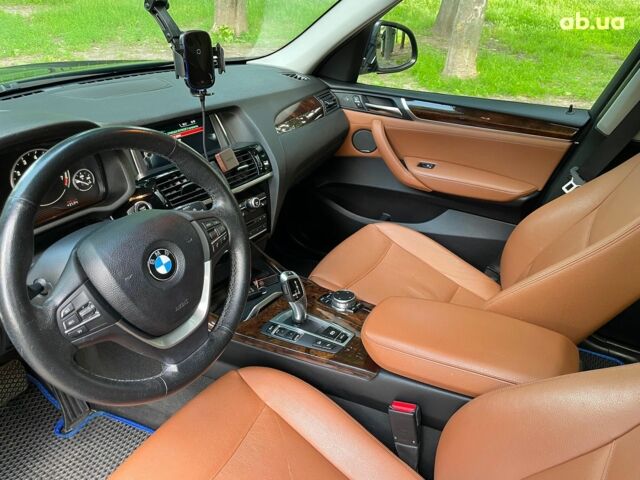 Синий БМВ Х3, объемом двигателя 3 л и пробегом 146 тыс. км за 24590 $, фото 26 на Automoto.ua