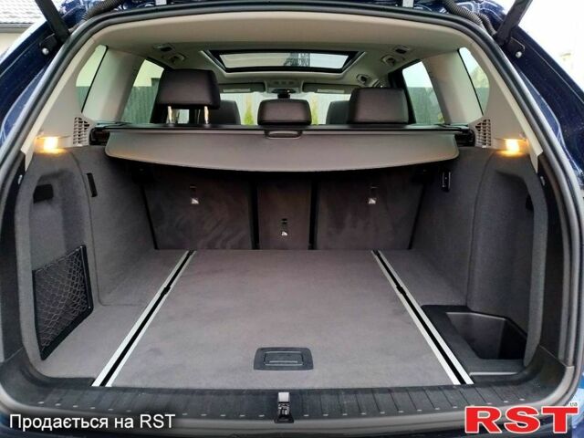 Синий БМВ Х3, объемом двигателя 2 л и пробегом 81 тыс. км за 19300 $, фото 4 на Automoto.ua