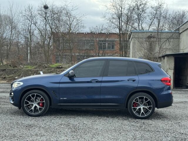 Синий БМВ Х3, объемом двигателя 2 л и пробегом 142 тыс. км за 28900 $, фото 4 на Automoto.ua