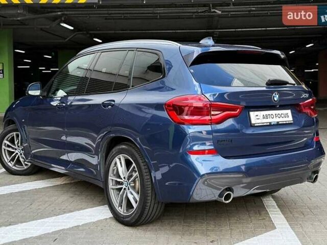 Синій БМВ Х3, об'ємом двигуна 2 л та пробігом 121 тис. км за 28990 $, фото 4 на Automoto.ua
