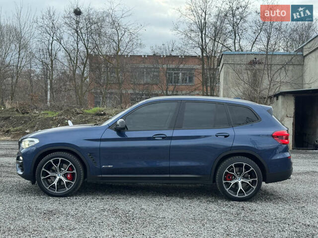 Синій БМВ Х3, об'ємом двигуна 2 л та пробігом 142 тис. км за 29300 $, фото 5 на Automoto.ua