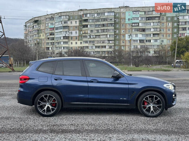 Синій БМВ Х3, об'ємом двигуна 2 л та пробігом 142 тис. км за 29300 $, фото 4 на Automoto.ua