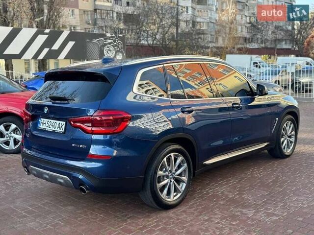 Синий БМВ Х3, объемом двигателя 2 л и пробегом 74 тыс. км за 25900 $, фото 2 на Automoto.ua