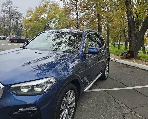 Синий БМВ Х3, объемом двигателя 2 л и пробегом 65 тыс. км за 25600 $, фото 4 на Automoto.ua
