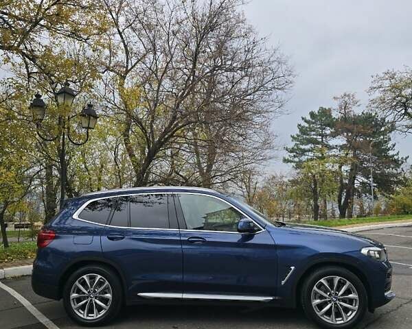 Синий БМВ Х3, объемом двигателя 2 л и пробегом 65 тыс. км за 25600 $, фото 8 на Automoto.ua